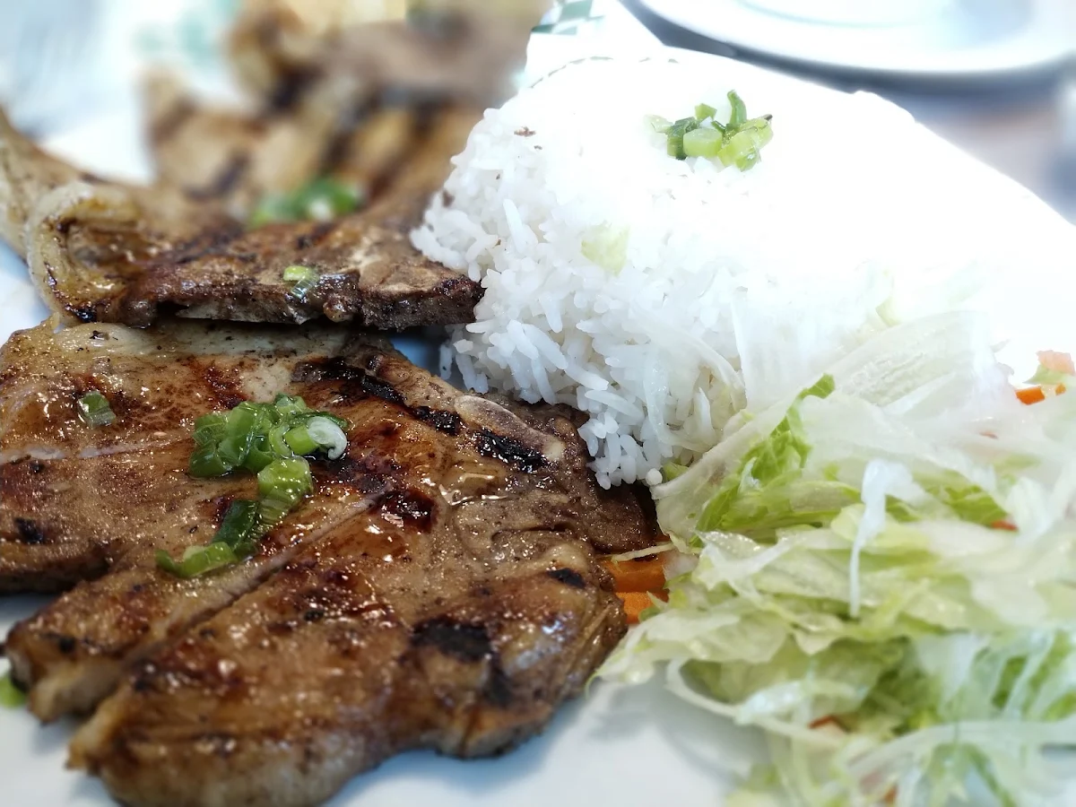 Two Grilled Pork Chop on Steamed Rice