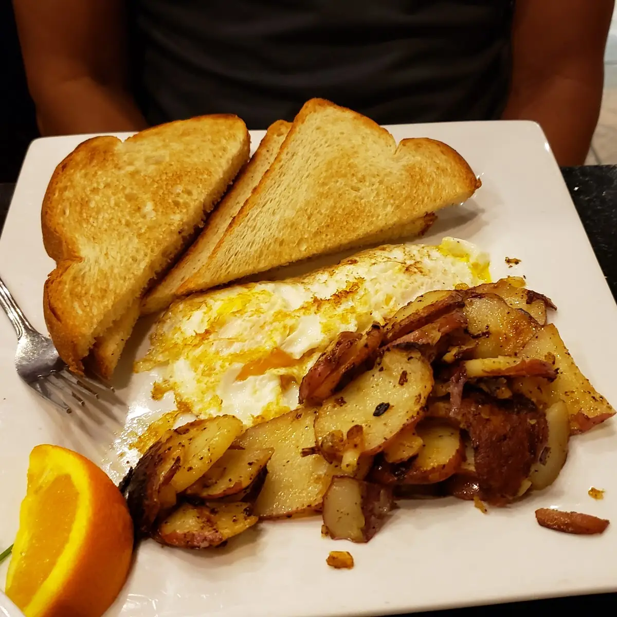 Scrambled Eggs with Cheddar Cheese Bacon Ham and Rye Bread with Butter