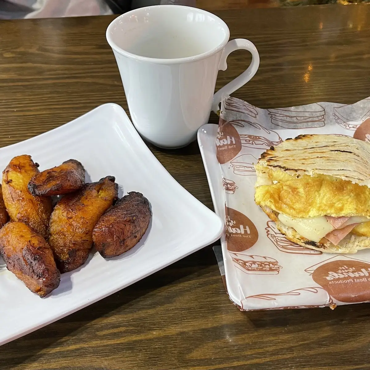 Plantains and Arepa with Ham Egg and Cheese