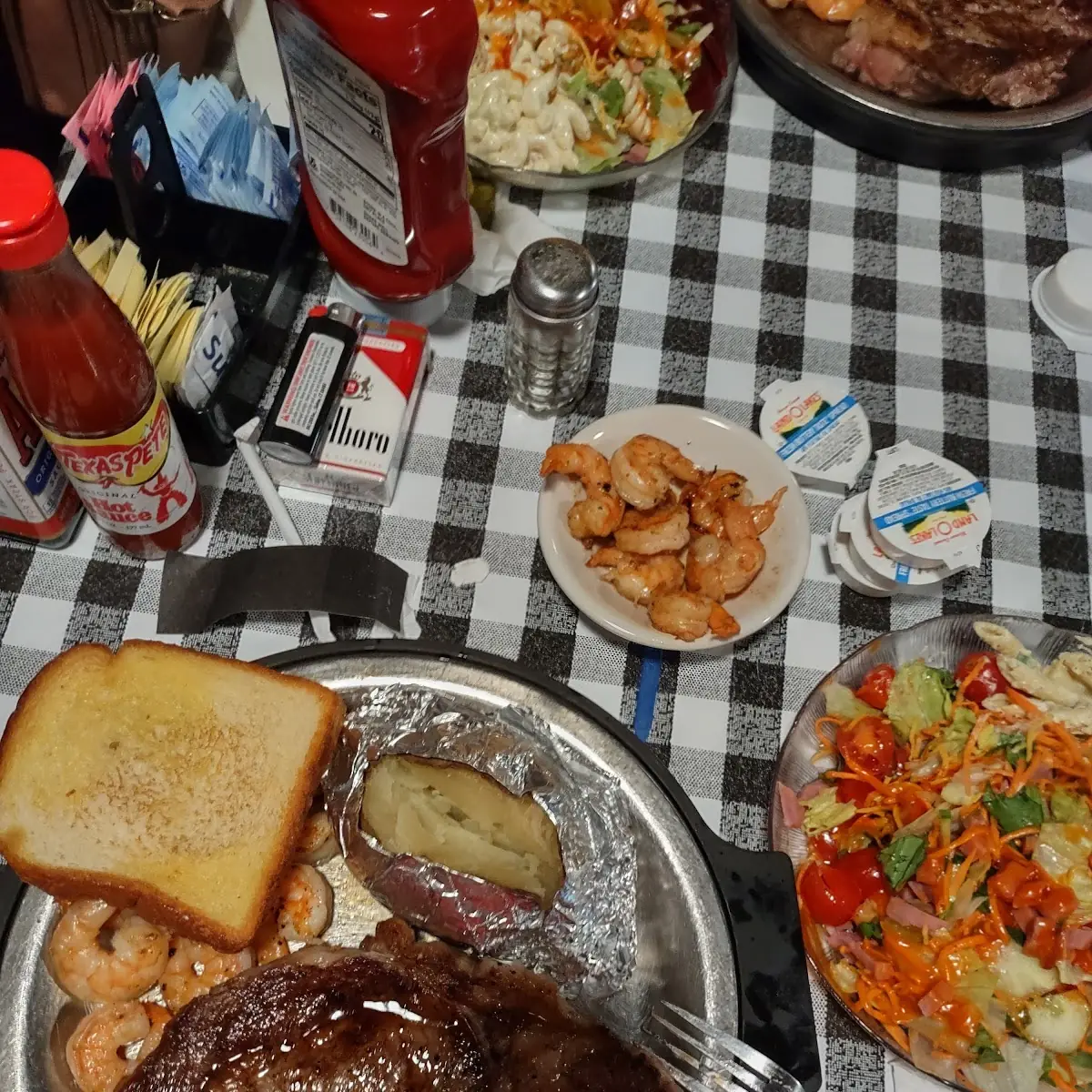 9 Oz Ribeye Steak and Grilled Shrimp
