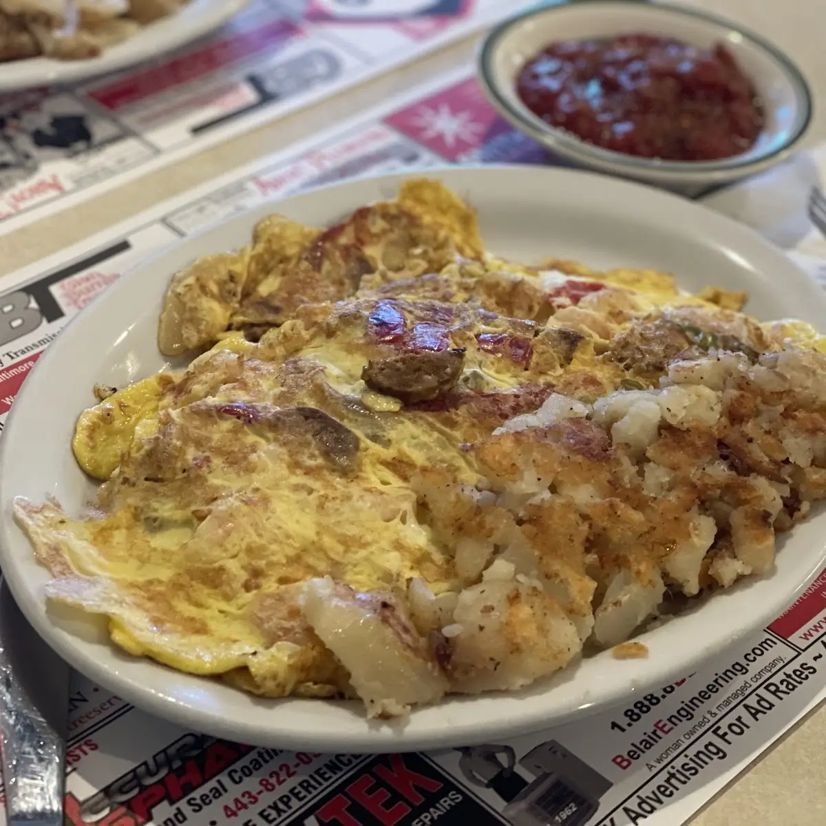 Breakfast Platter with One Egg Scrambled and One Egg over Medium