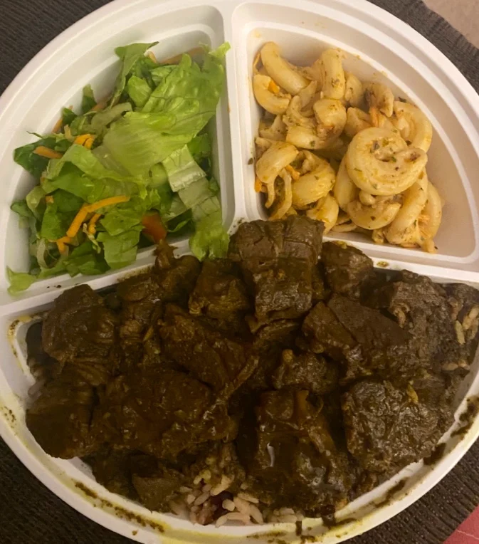 Goat Curry on Rice and Peas, Island Spice Flava Inc