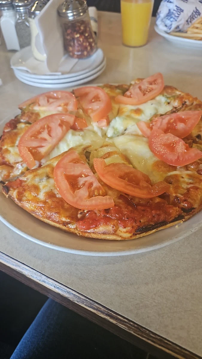 All Dressed Pizza with Uncooked Tomatoes