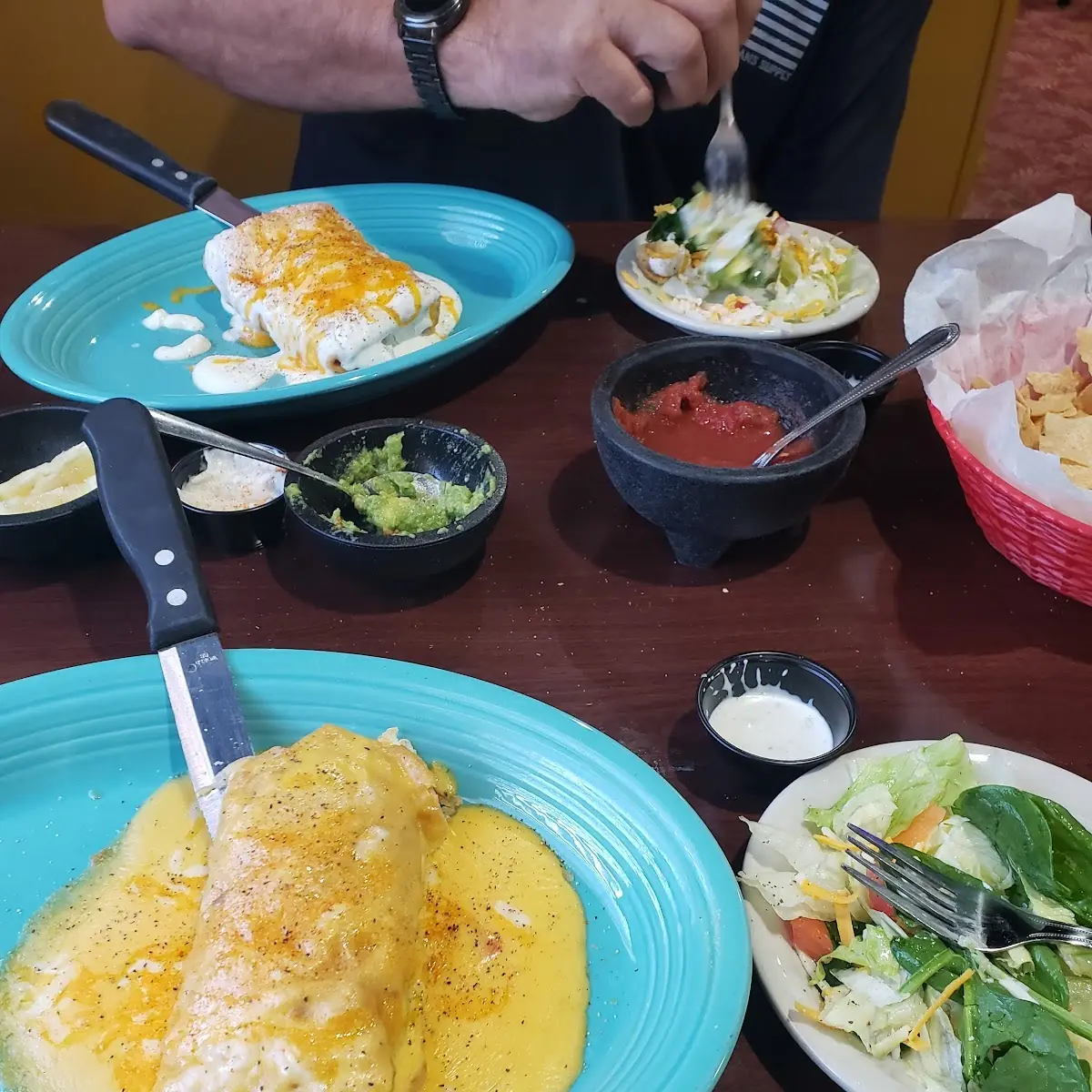 Beef Chimichanga with Cheese Sauce