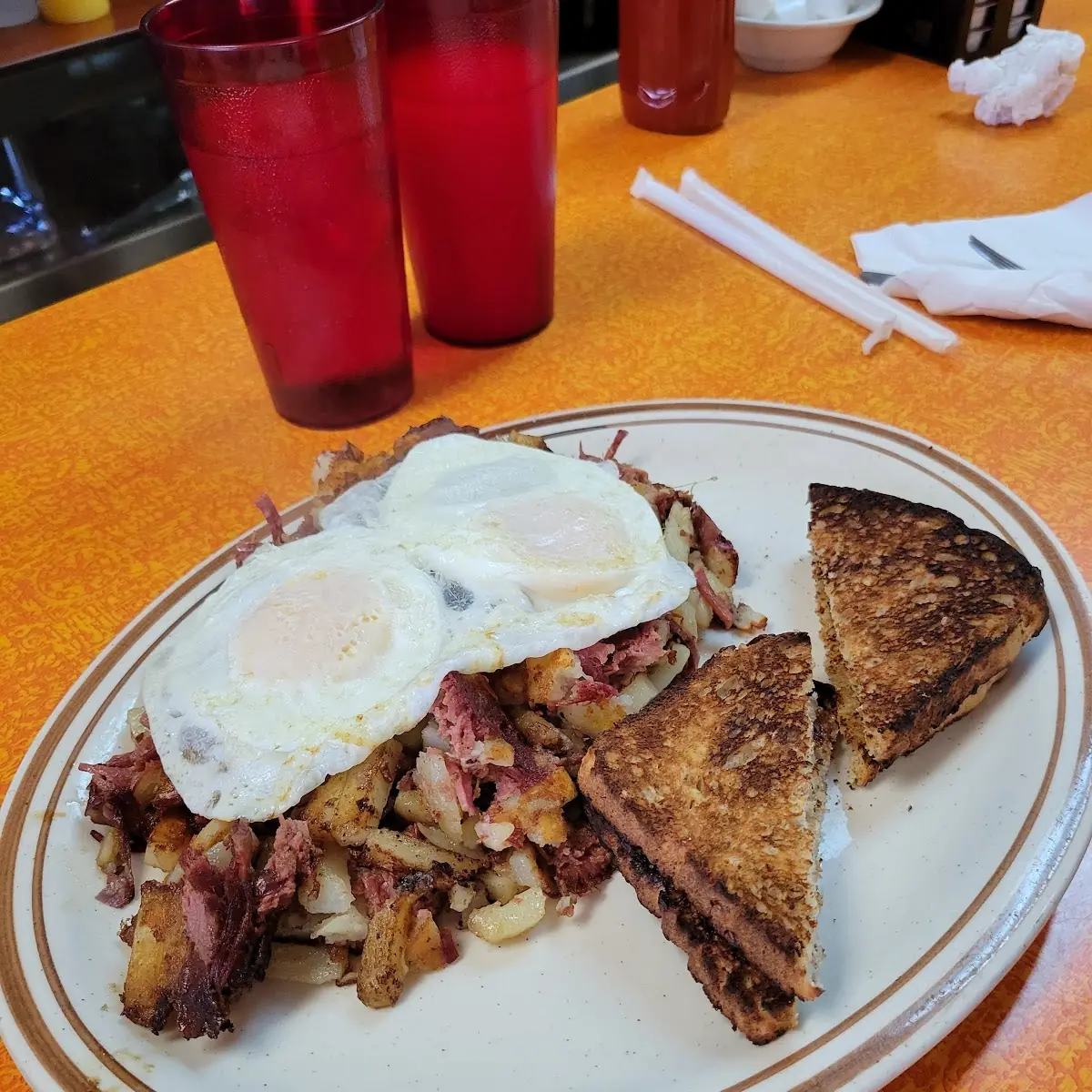 Corned Beef Hash and Eggs with Toast