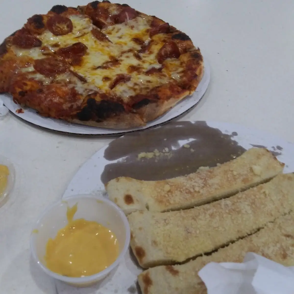 Pepperoni Pizza and Bread Sticks