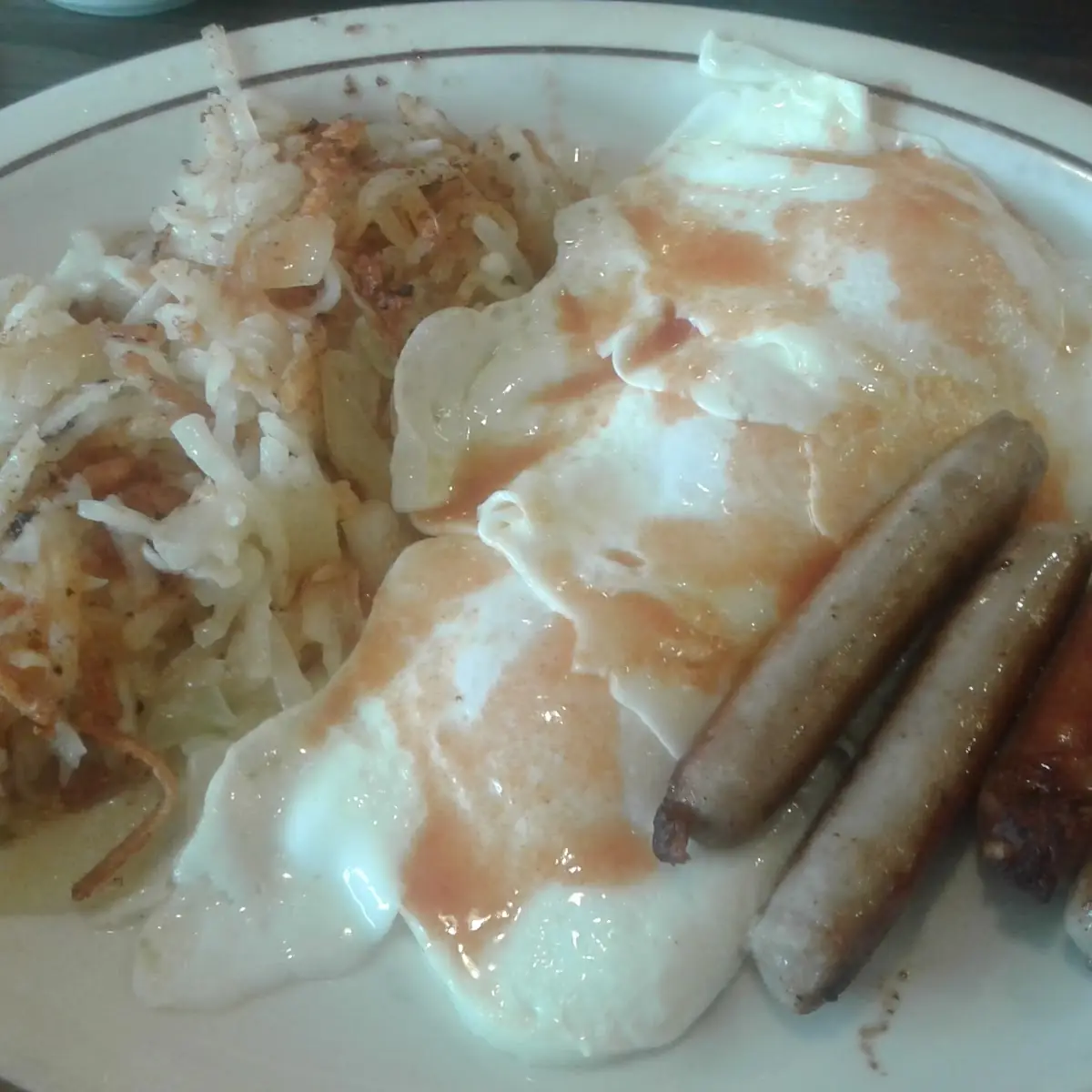 Breakfast Hash Browns Eggs over Easy with Sausage Links
