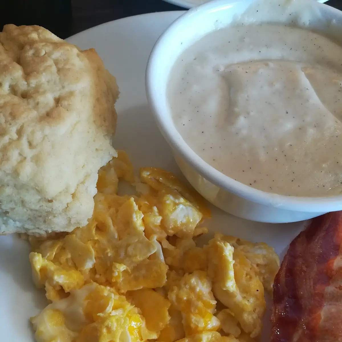 Scrambled Eggs Bacon w Biscuit and Gravy