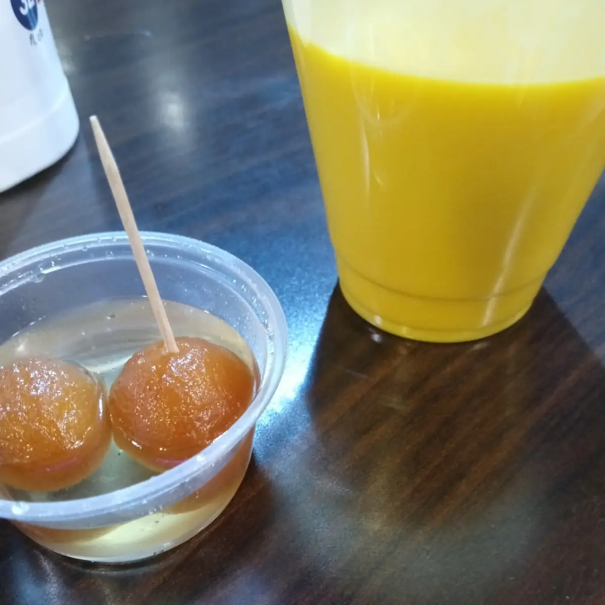 Gulab Jamun and Mango Lassi Drink