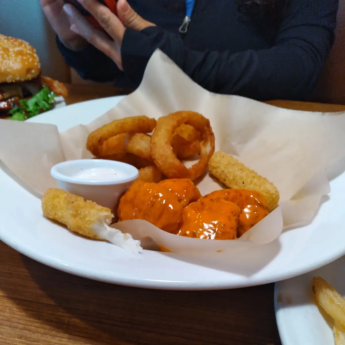 Sampler Platter Mozzarella Cheese Sticks Onion Rings and Buffalo Chicken Wings