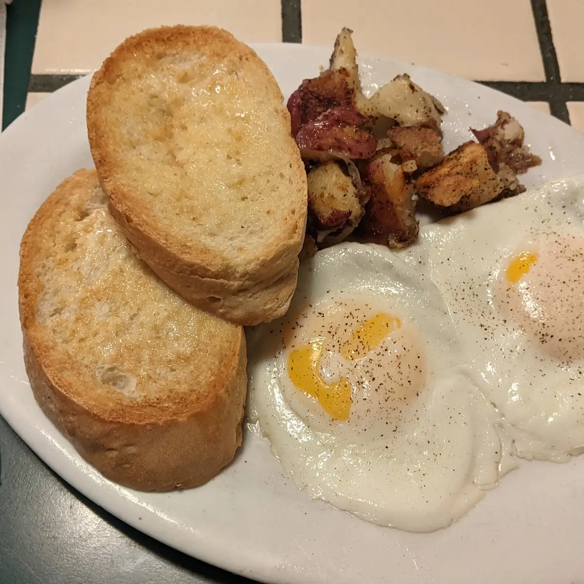 Two Eggs with Sausage and Toast