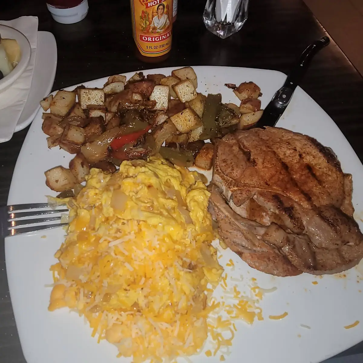 Fried Pork Chops with Cheese Eggs and Red Patatos