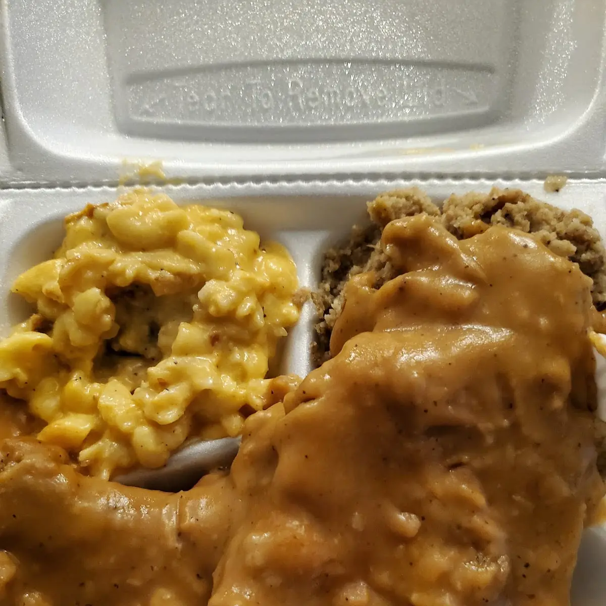 Smothered Pork Chops w Dressing & Mac & Cheese