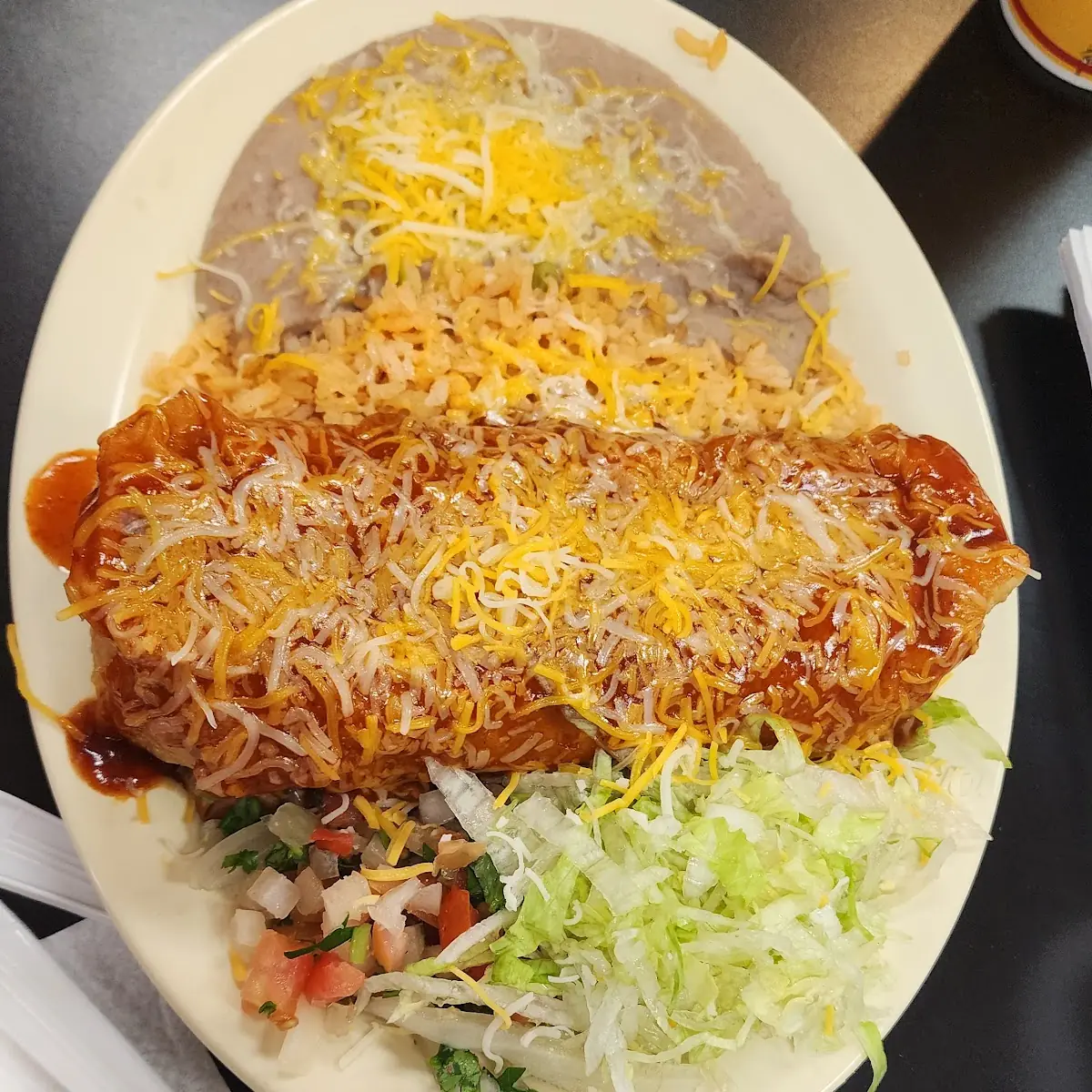 8 Beef Chimichanga with Red Sauce Rice & Beans