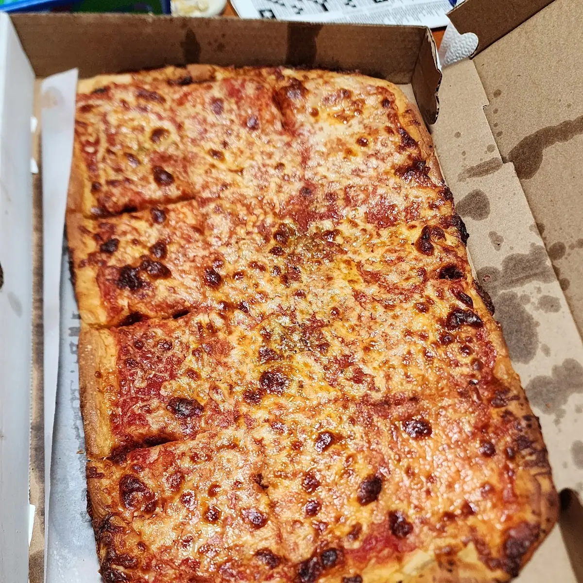 Bar Pizzas Sausage Pepperoni and Onions and Cheese Pizza on the Right