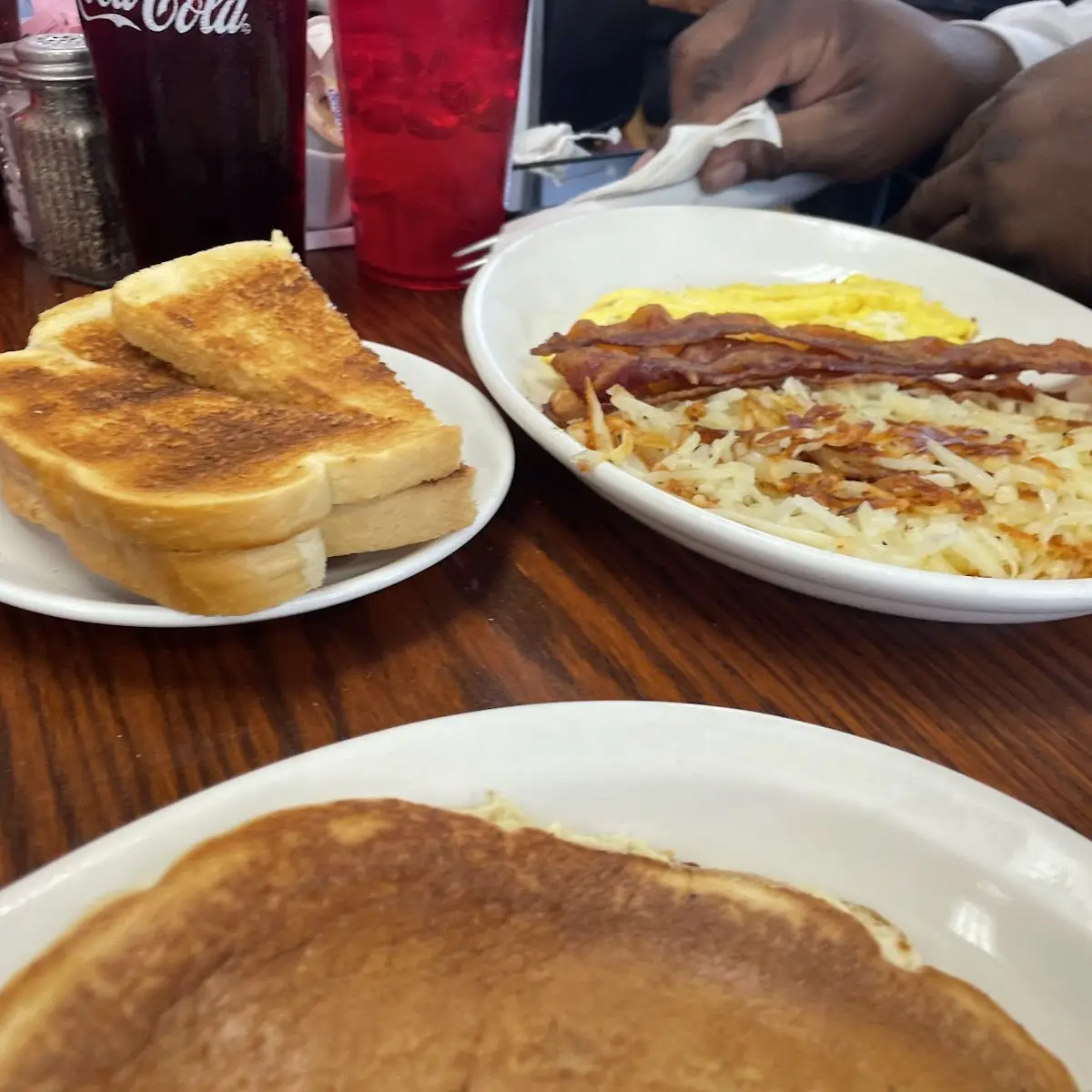 Pancakes Toast Eggs Bacon and Hash Browns