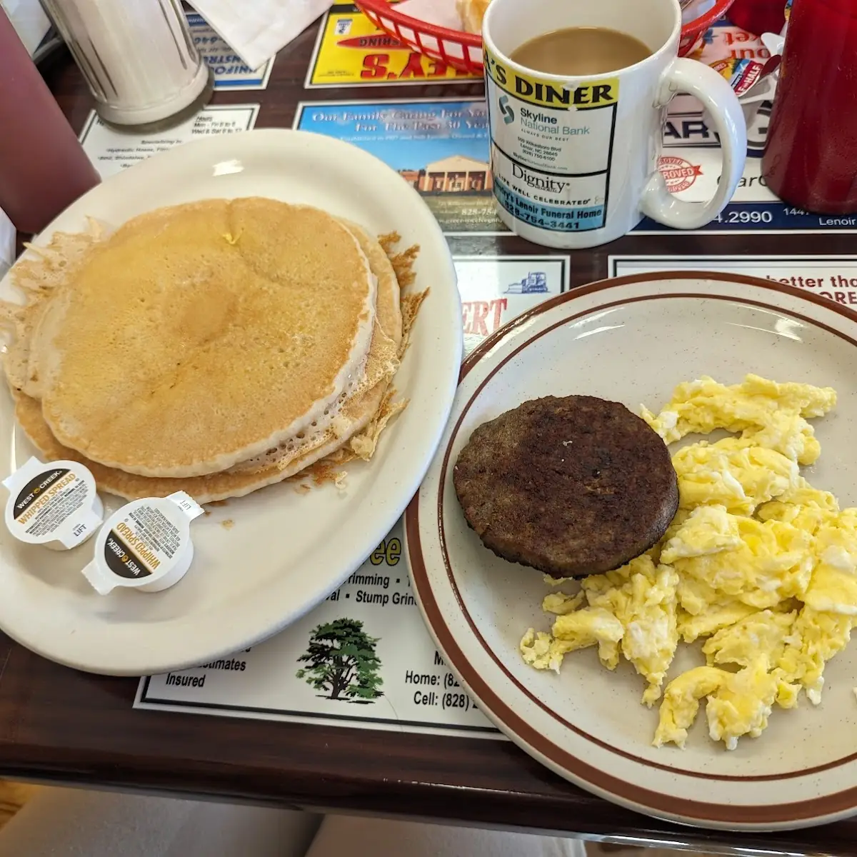Pancakes Two Scrambled Eggs and Sausage Patty