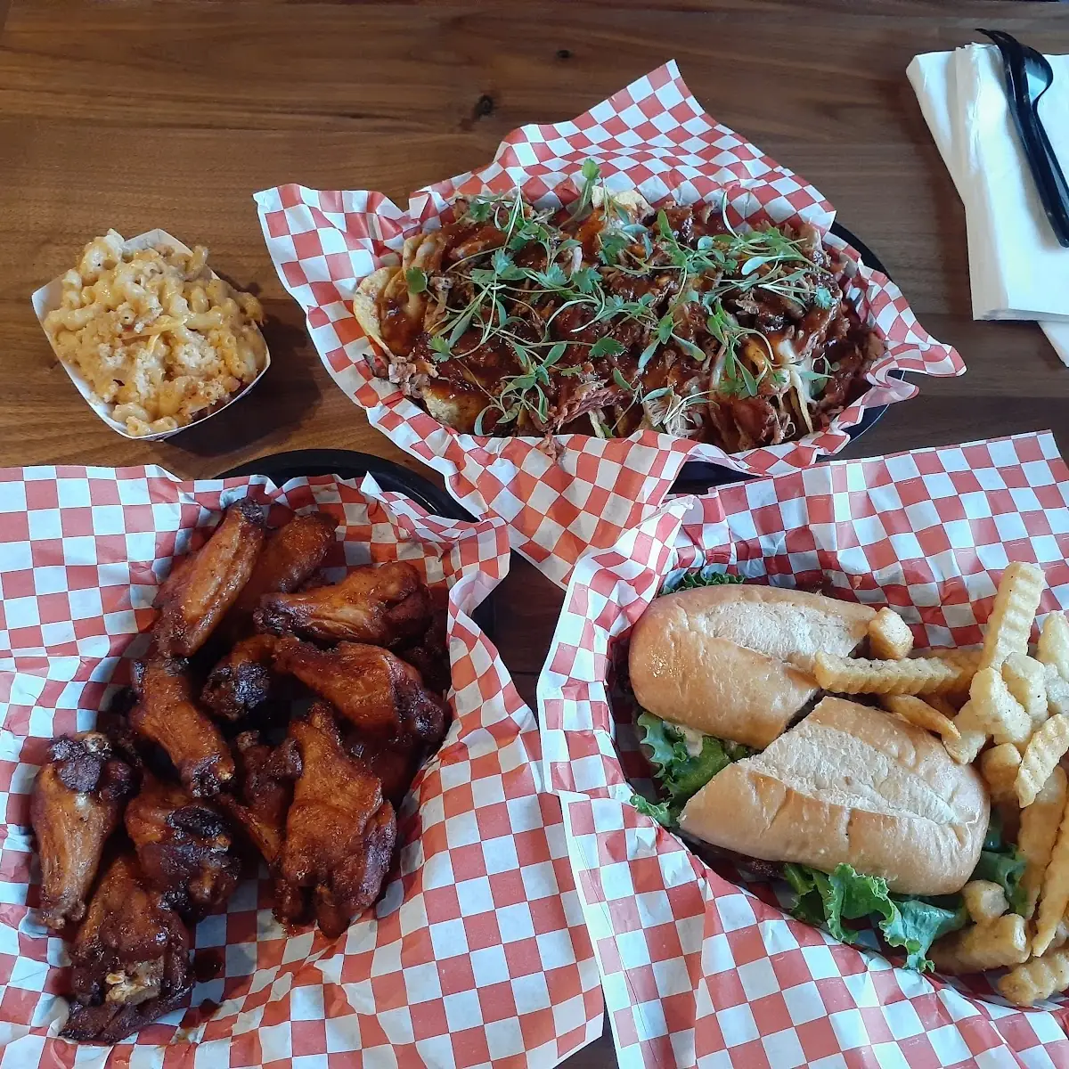 Pulled Pork Nachos BBQ Wings Catfish Sandwich and Fries
