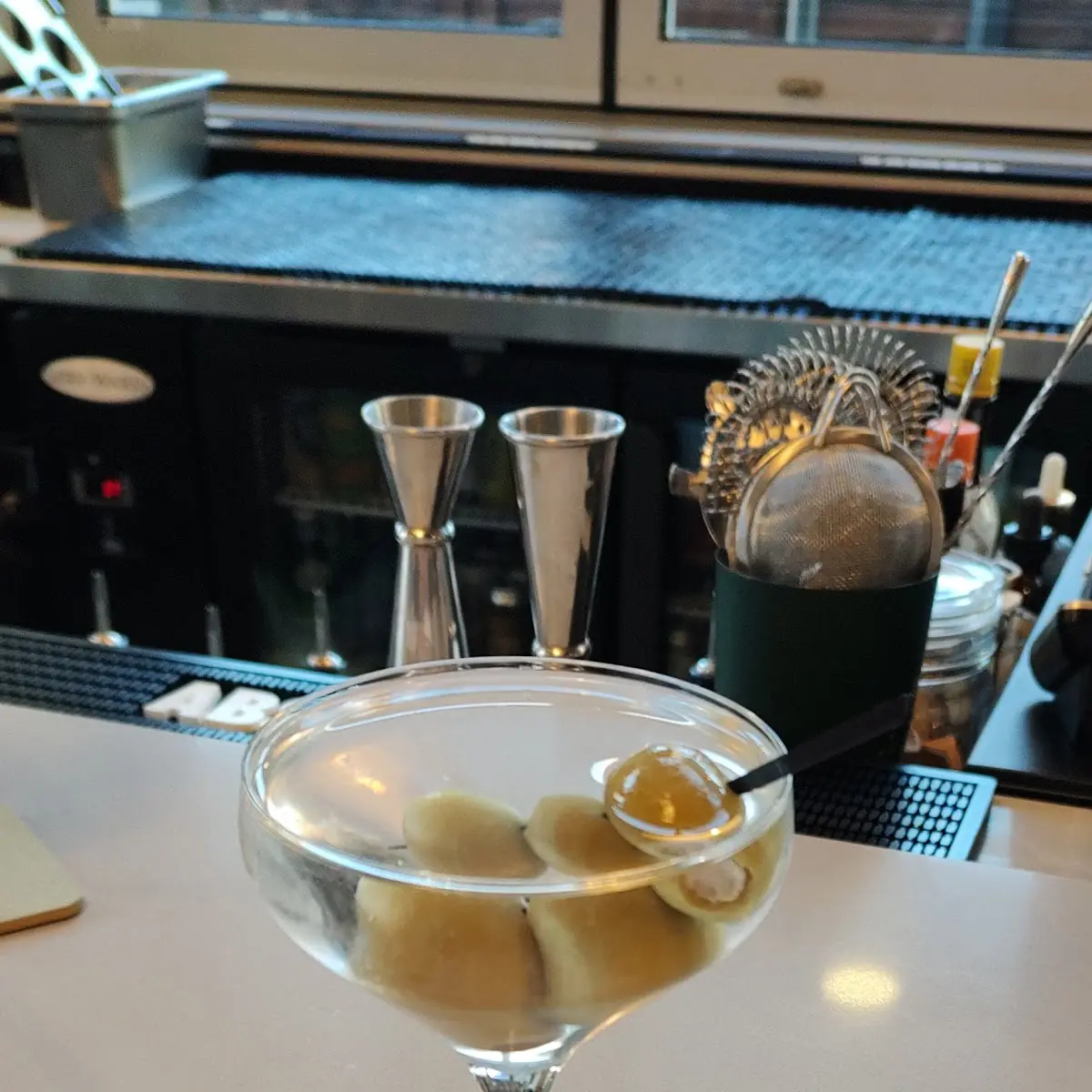 Tito's Martini with Feta Stuffed Olives