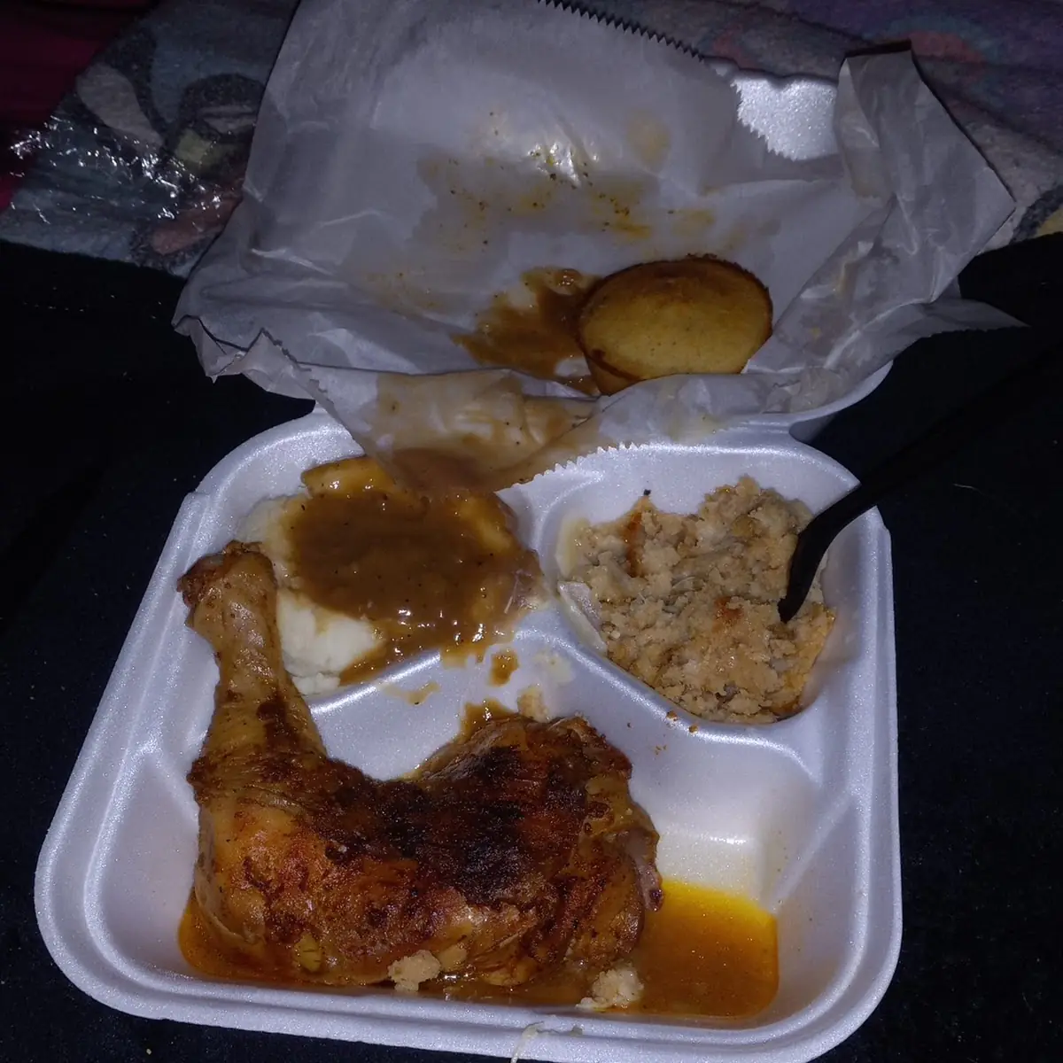 Baked Chicken Dressing and Mashed Potatoes with Brown Gravy and a Cornbread Role