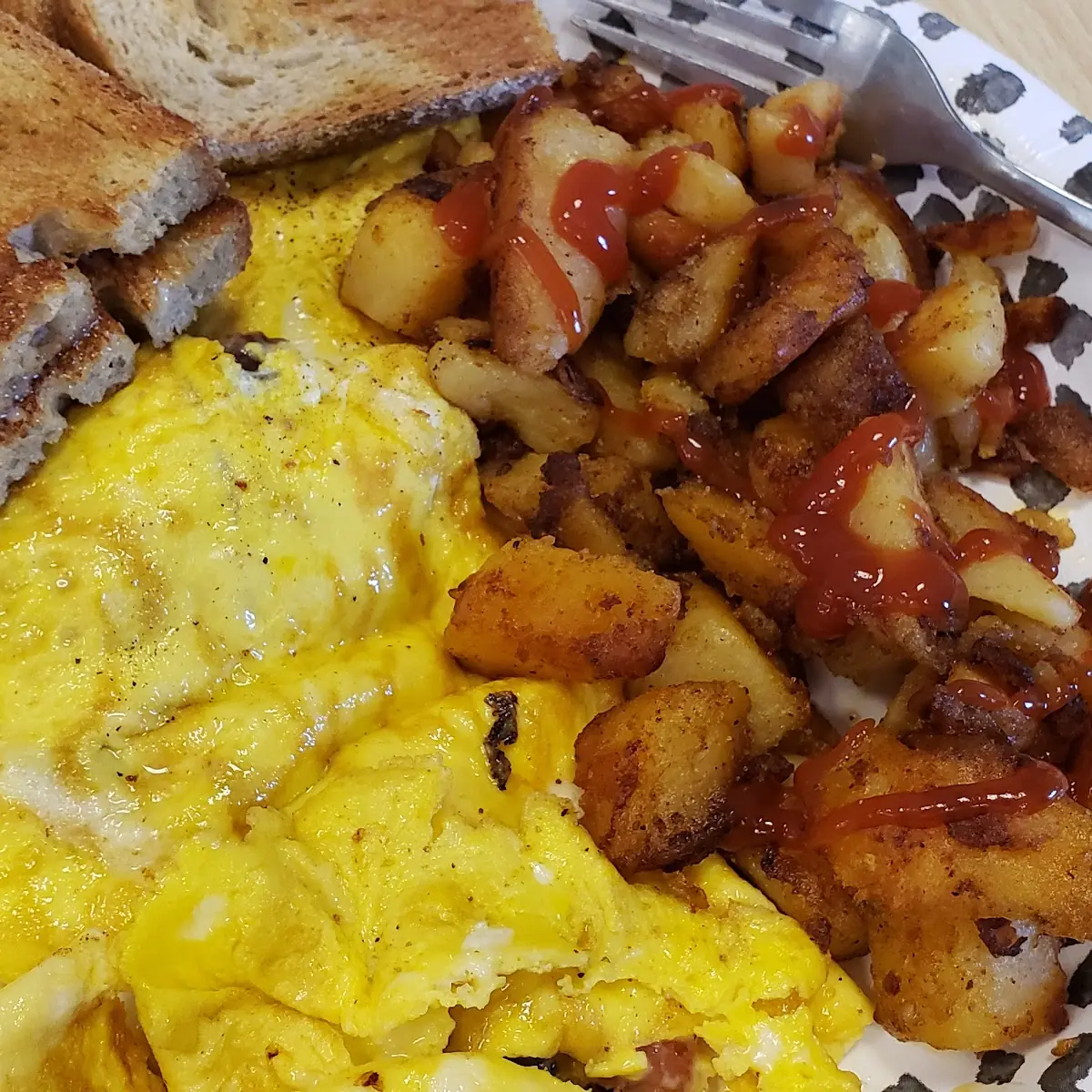 Bacon and Cheese Omelet and Hash Browns