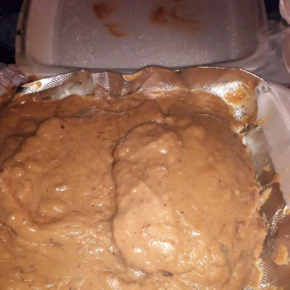 Smothered Pork Chops over Rice