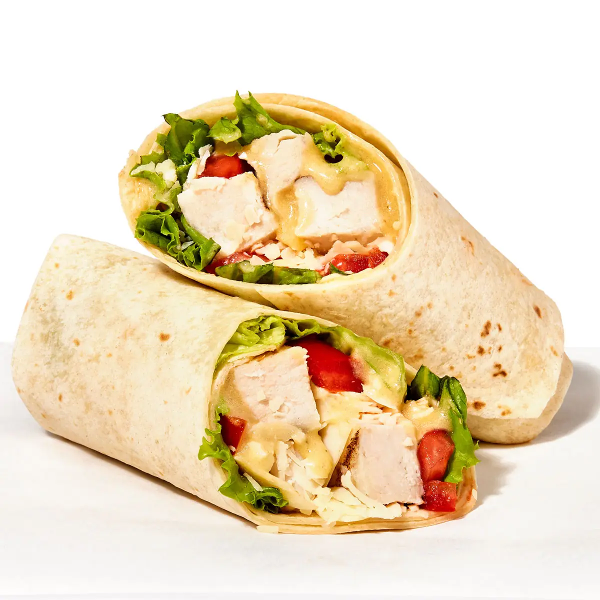 Grilled Chicken Caesar Wrap Sandwich with Caesar Dressing Lettuce and Tomato