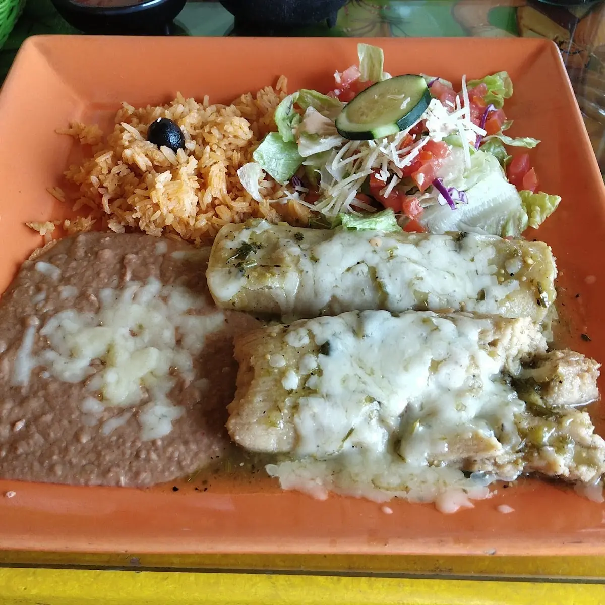 Refried Beans Rice and Enchiladas