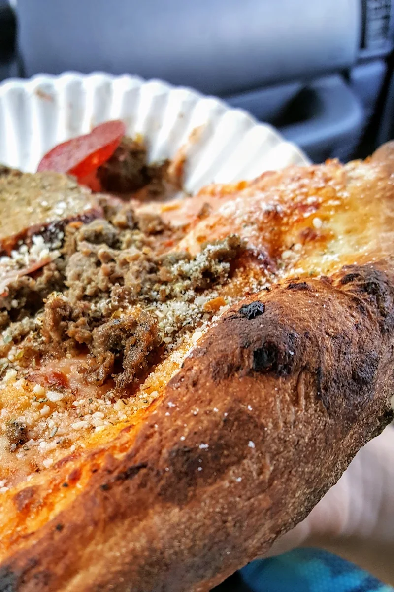 Pepperoni and Sausage Pizza Slice