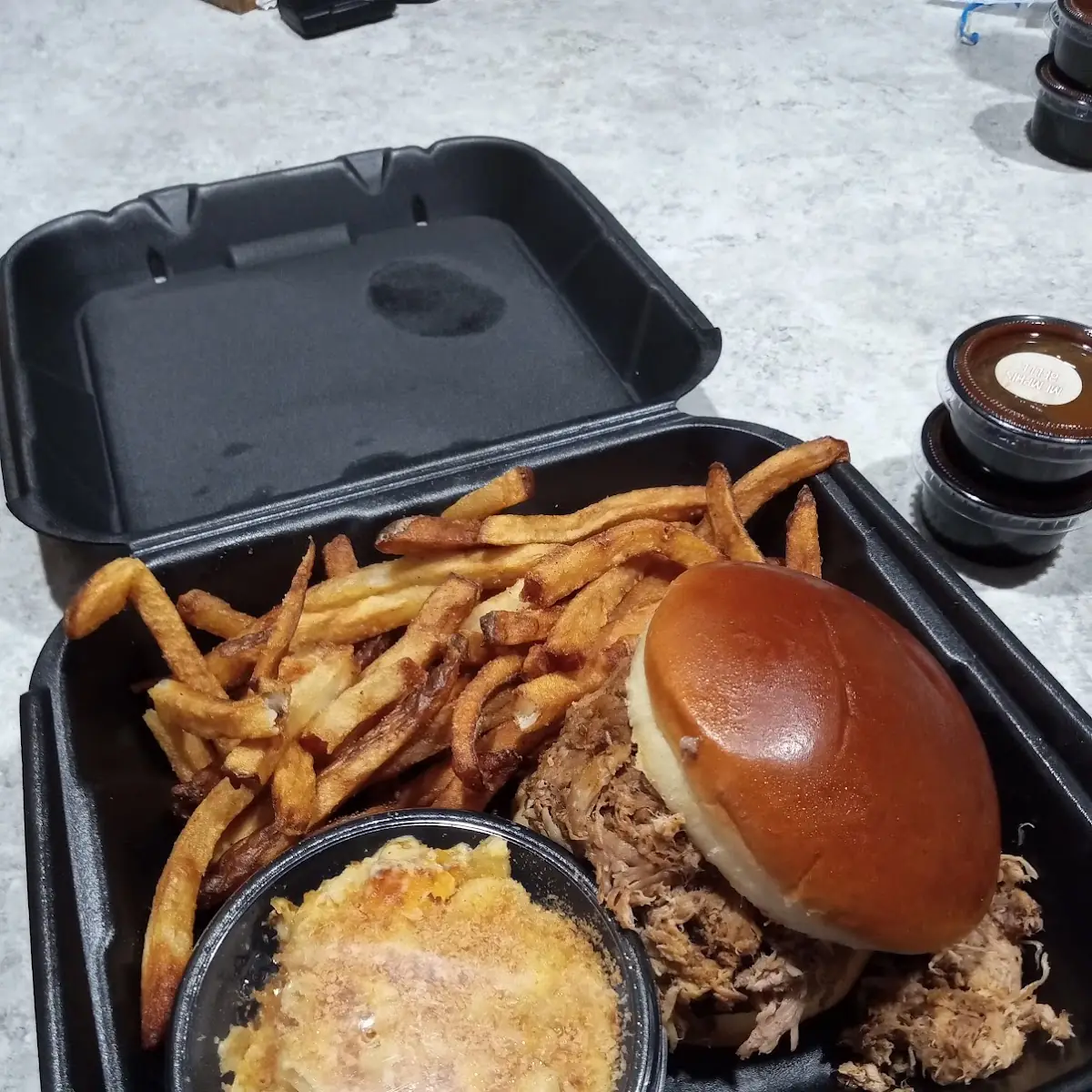 Pulled Pork Sandwich with Fries and Mac and Cheese