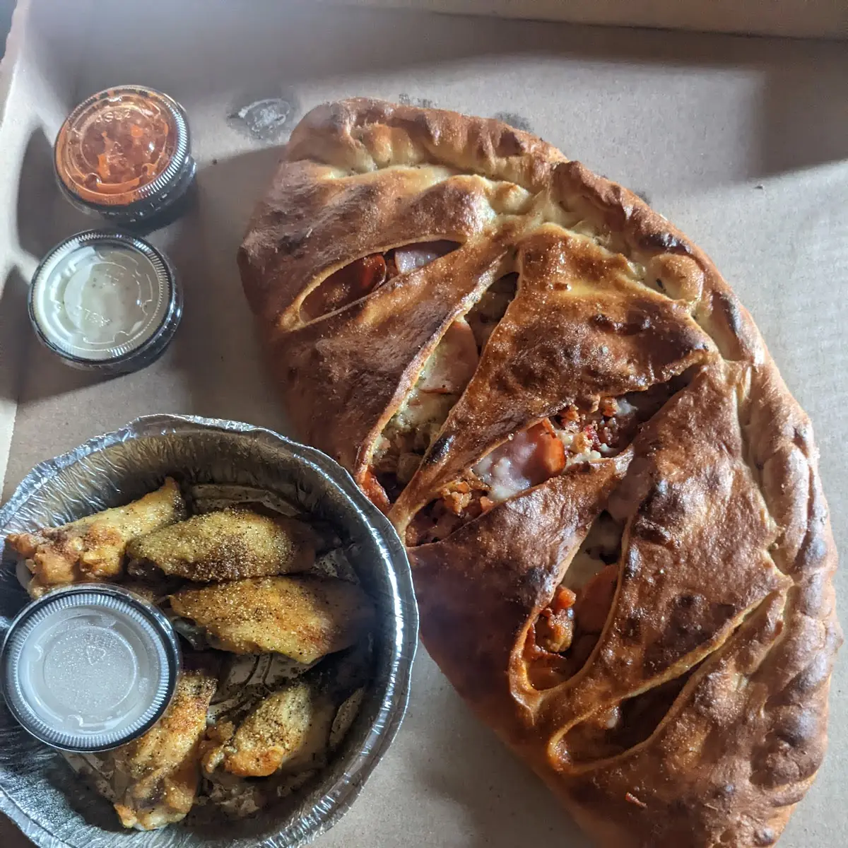 Calzone and Lemon Pepper Wings