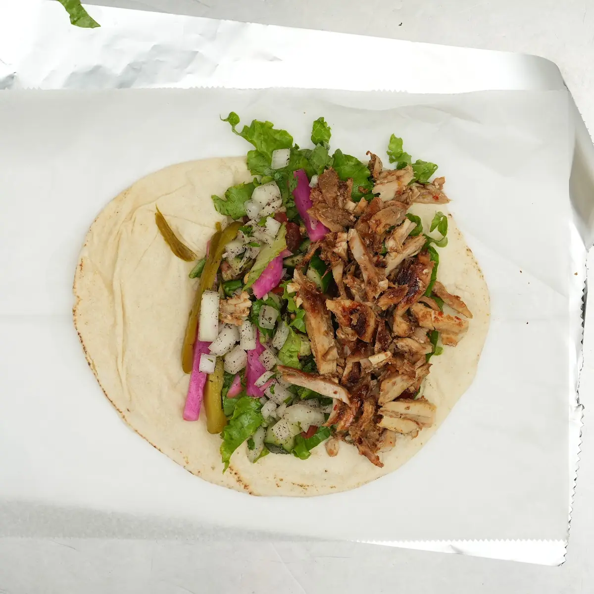 Chicken Shawarma with Lettuce Tomatoes Pickles & Garlic Sauce