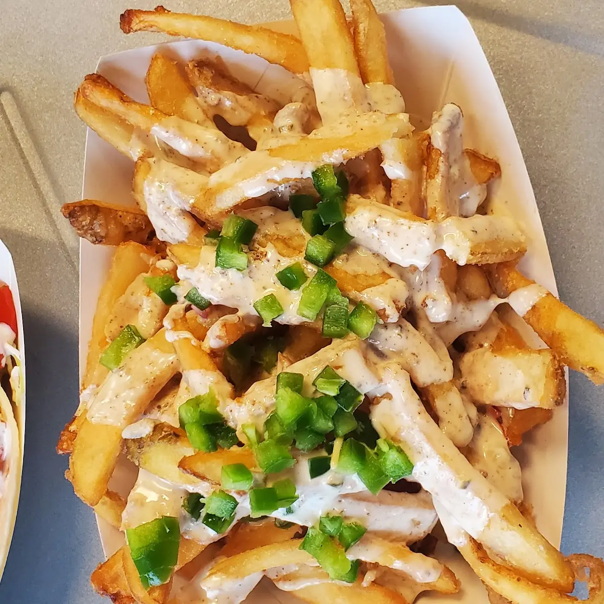 Garlic Cheese Fries with Jalapeños