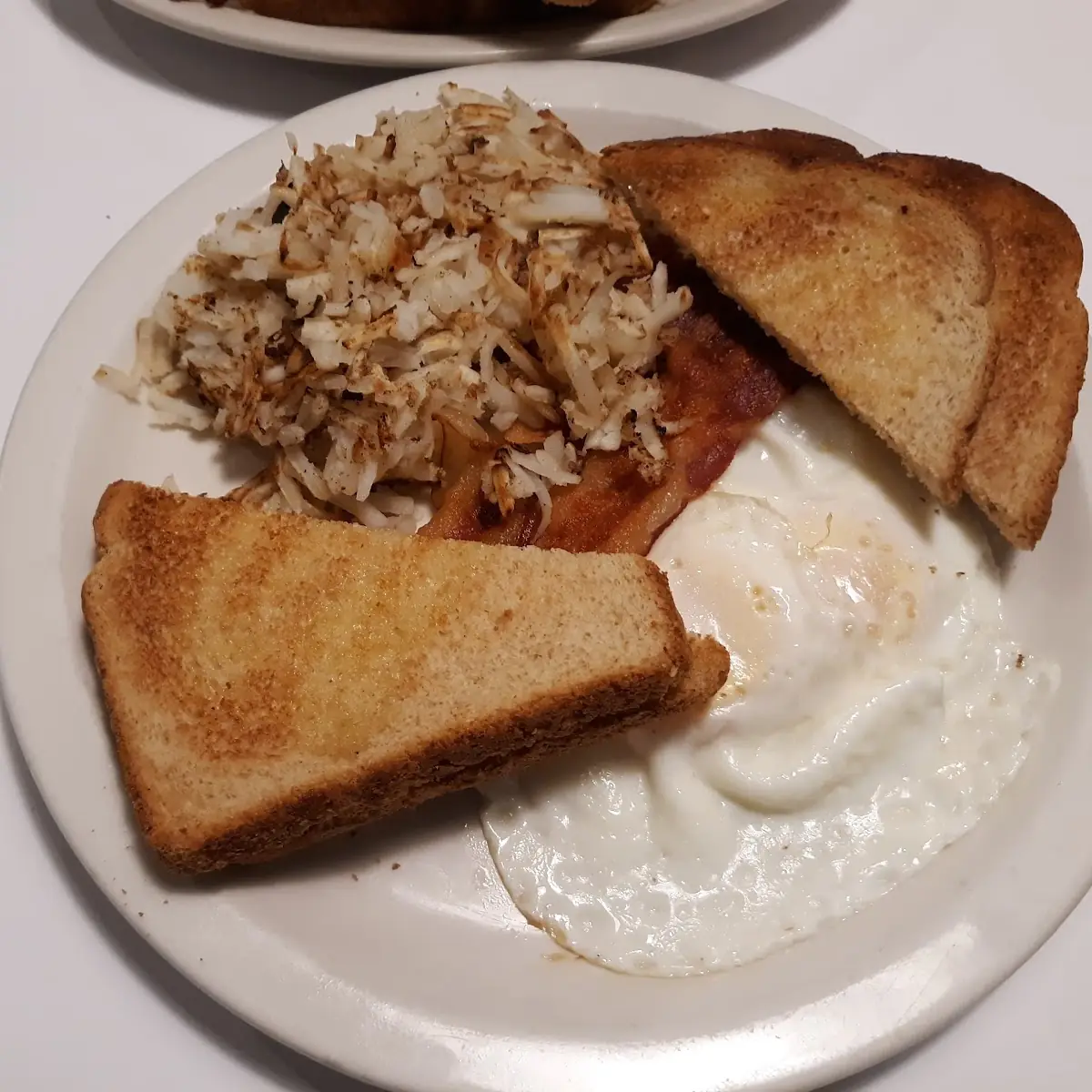 2 Egg Wheat Toast Bacon and Hash Browns