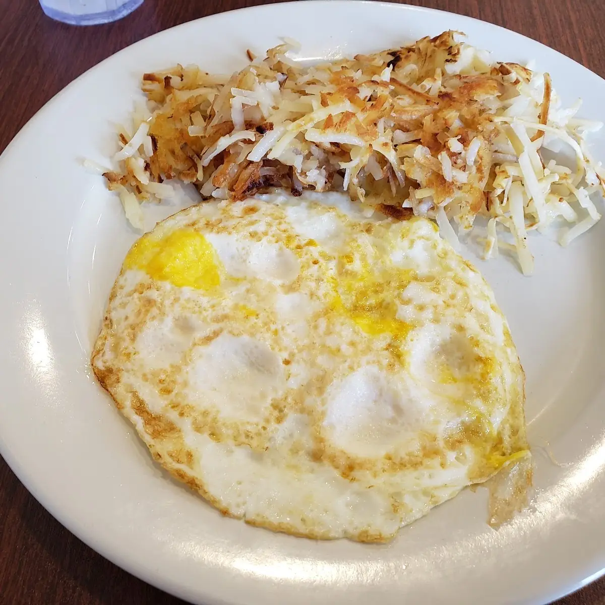 Two Eggs over Hard and Hash Browns