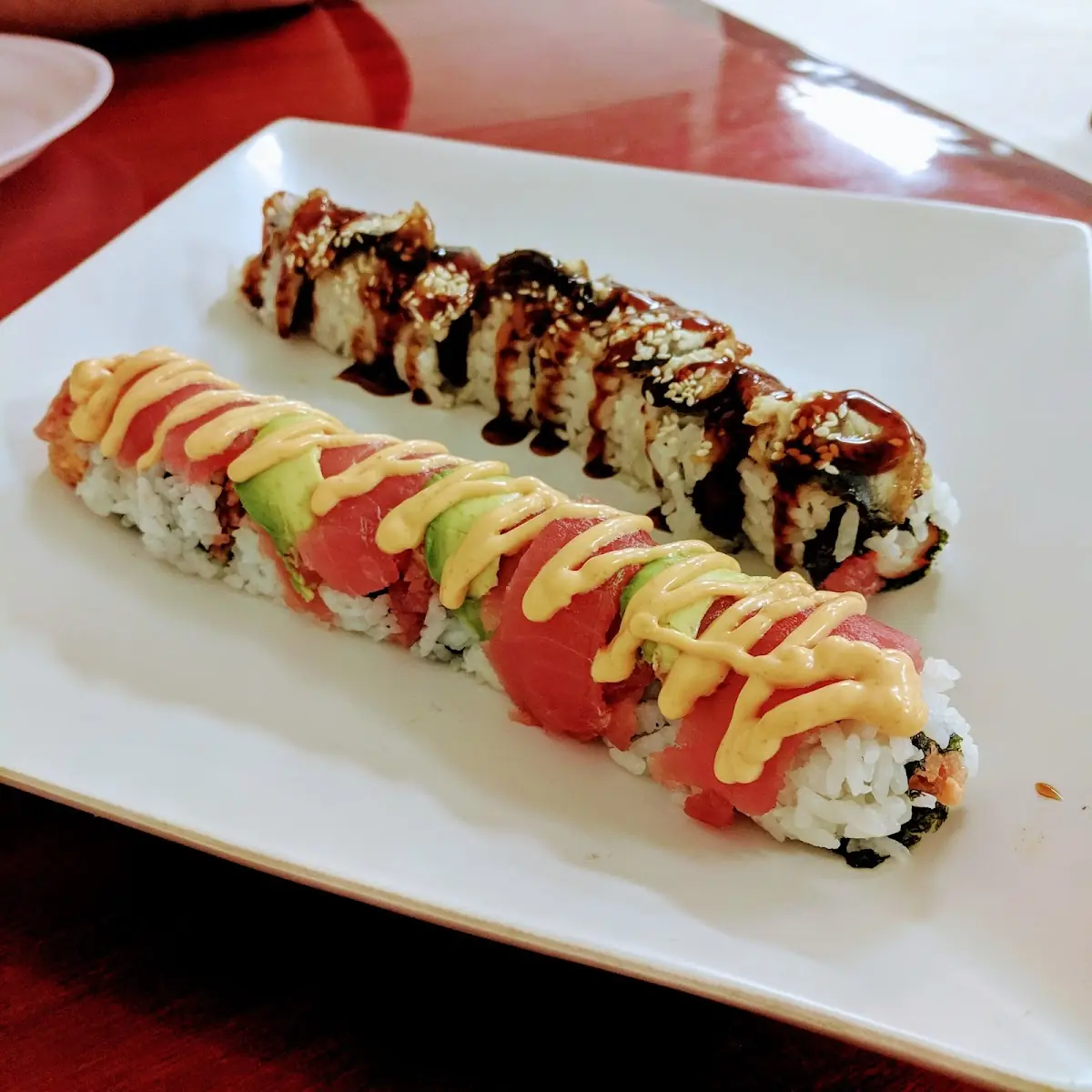 Spicy Tuna Tataki Roll Front & House Special Roll Back