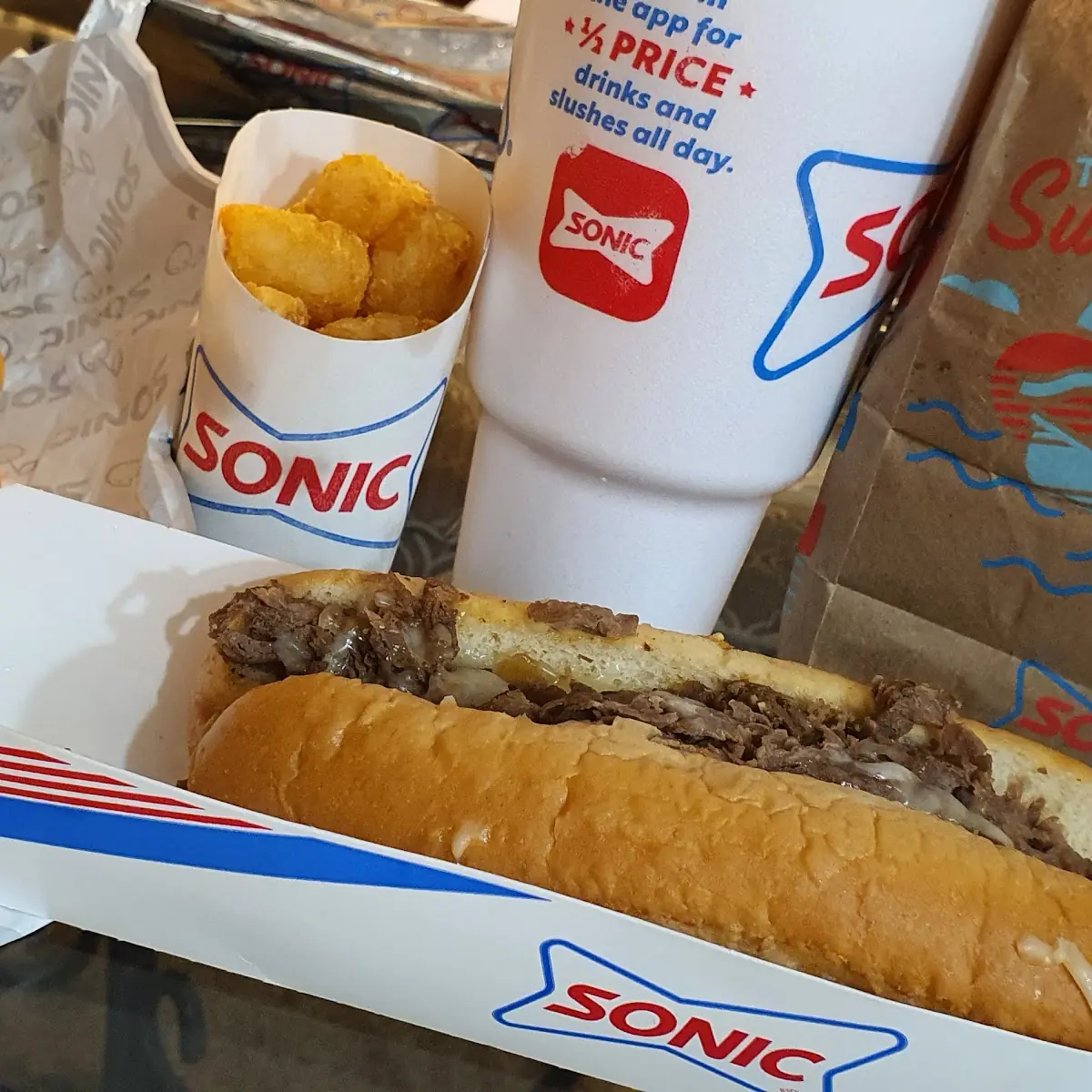 Tots Burger Cheese Steak Sandwich & a Cherry Limeade
