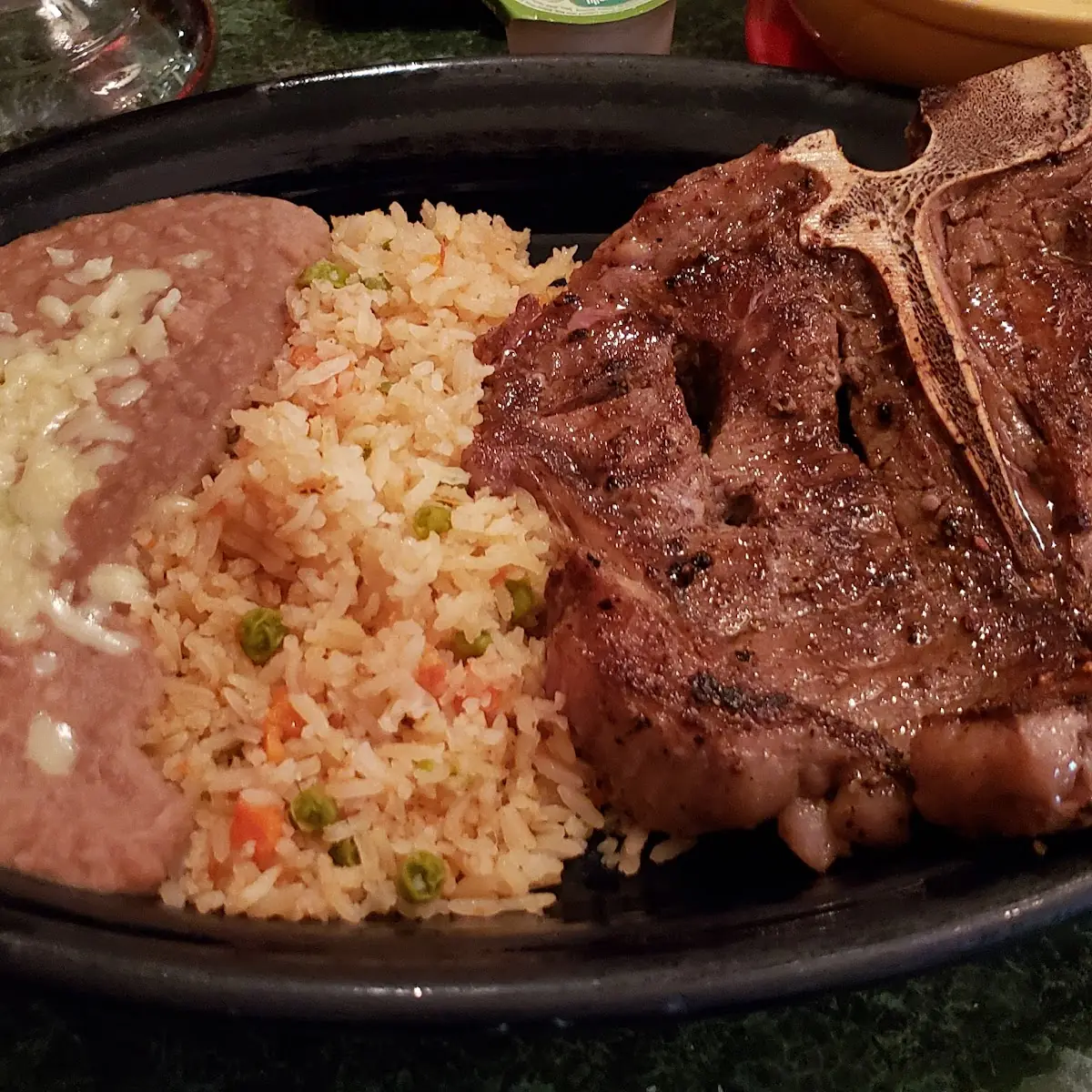 Tone Fried Rice & Refried Beans Topped Queso Cheese