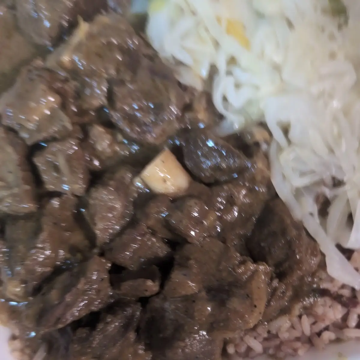 Curry Goat Cabbage Rice and Peas
