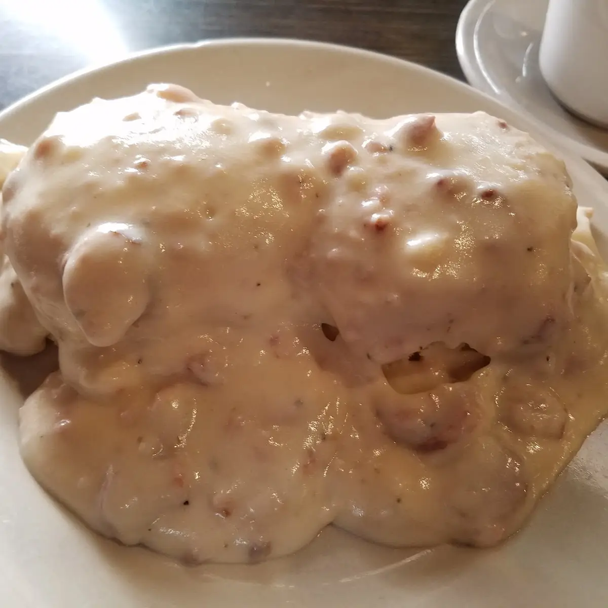 Biscuits & Gravy with Two Eggs & Country Potatoes