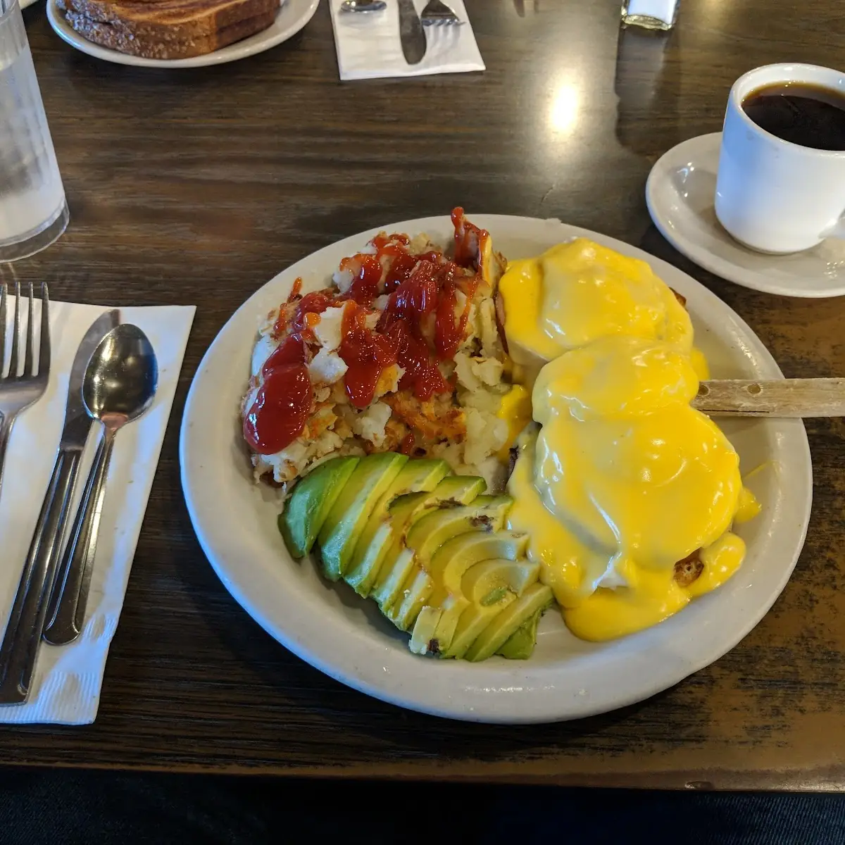 Eggs Benedict with Avocado and Country Potatoes