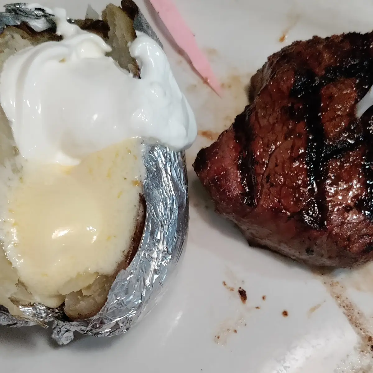 8 Oz NY Strip Steak with Baked Potato