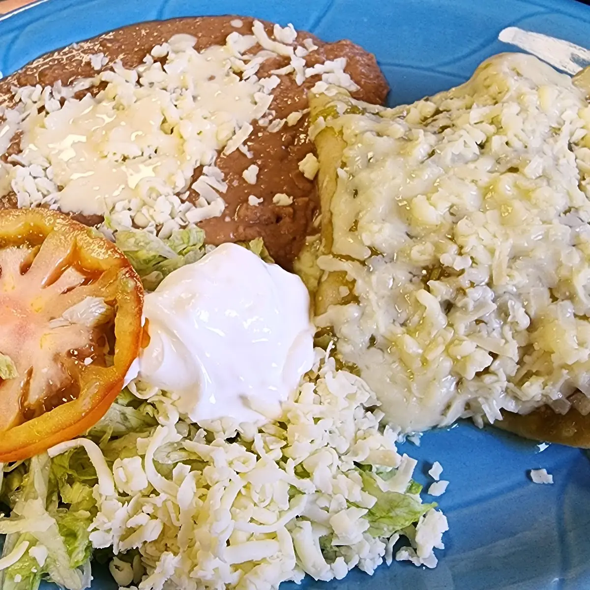 6. One Beef Enchilada, One Taco, Mexican Rice and Beans