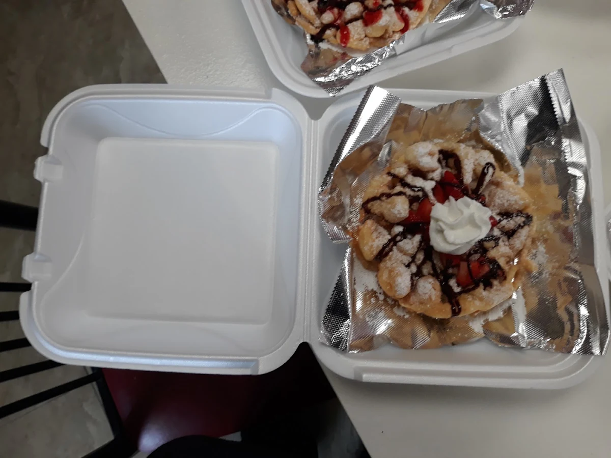 Chocolate with Fresh Strawberries on Funnel Cake