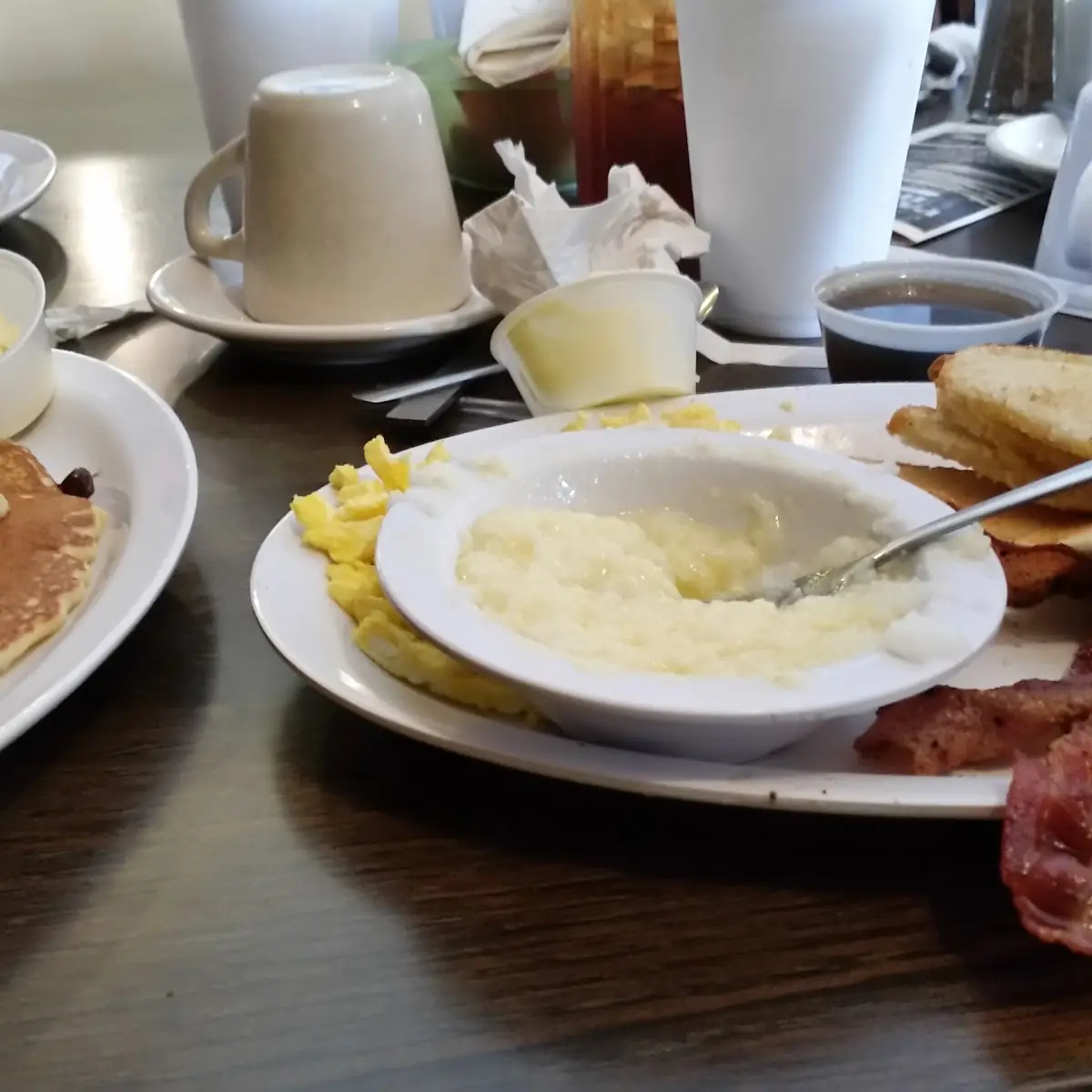 Eggs Grits Bacon Toast Chocolate Chip Pancakes