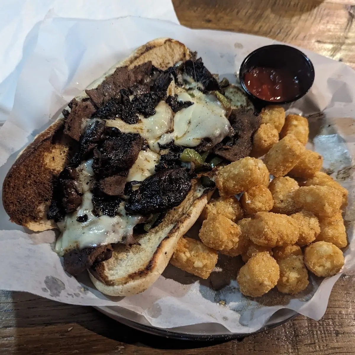 Philly Cheesesteak Sandwich and Tater Tots