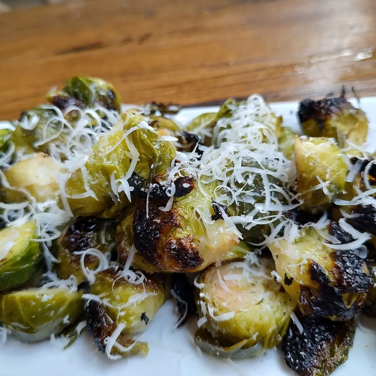 Fire-Roasted Brussels Sprouts with Fire-Roasted Garlic Evoo Sea Salt Pepper Parmesan