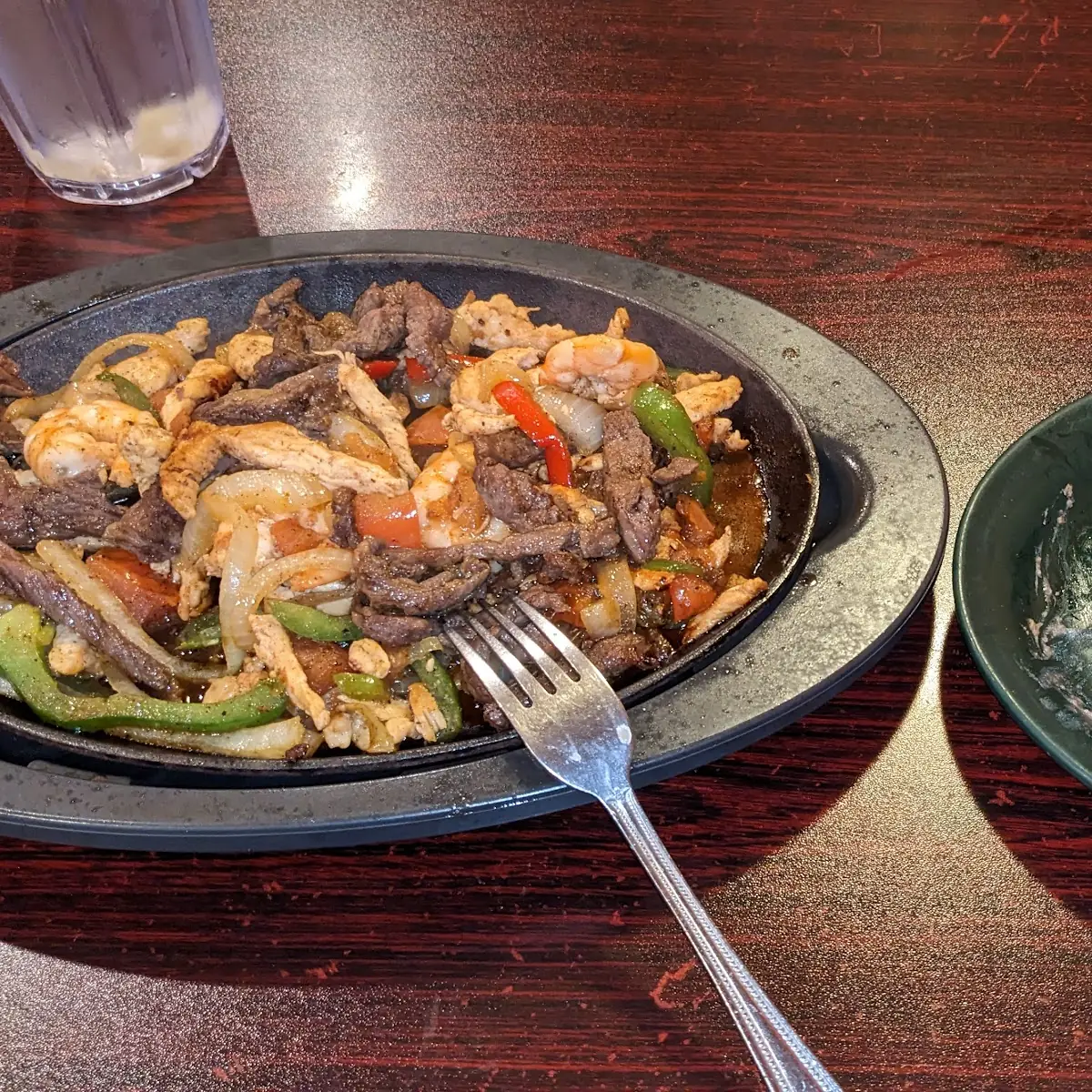 Steak Chicken and Shrimp Fajitas