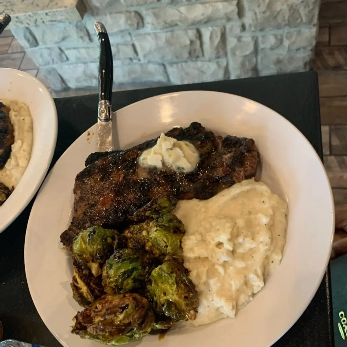 12oz Strip with Mashed Potatoes and Brussel Sprouts