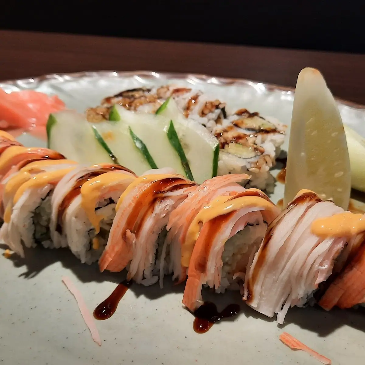 Angel Hair Roll in Front Eel Roll with Cucumber in Back